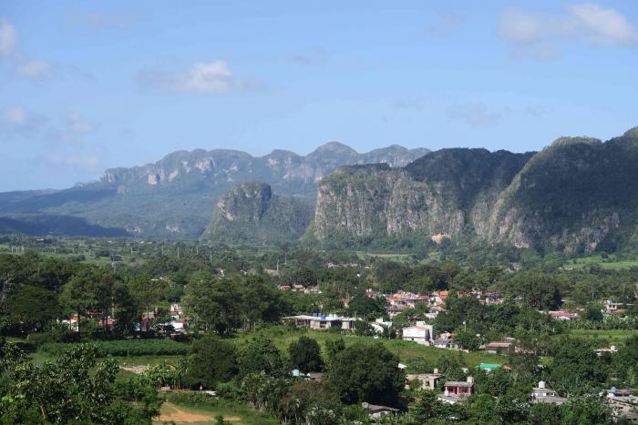 Viñales valley in the Province of Pinar del Rio is known worldwide for the production of the finest cigars and for its typical geological steep hills, the Mogotes. Pinar del Rio, Cuba. Viñales valley in the Province of Pinar del Rio is known worldwide for the production of the finest cigars and for its typical geological steep hills, the Mogotes. Pinar del Rio, Cuba.
