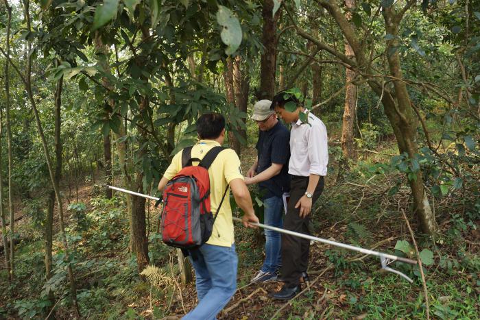 Prof. Hoang Van Sam, Ha Pham and Prof. Gregor Kozlowski in the Botanic Garden of VNUF Prof. Hoang Van Sam, Pham Thanh Ha and Prof. Gregor Kozlowski in the Botanic Garden of VNUF